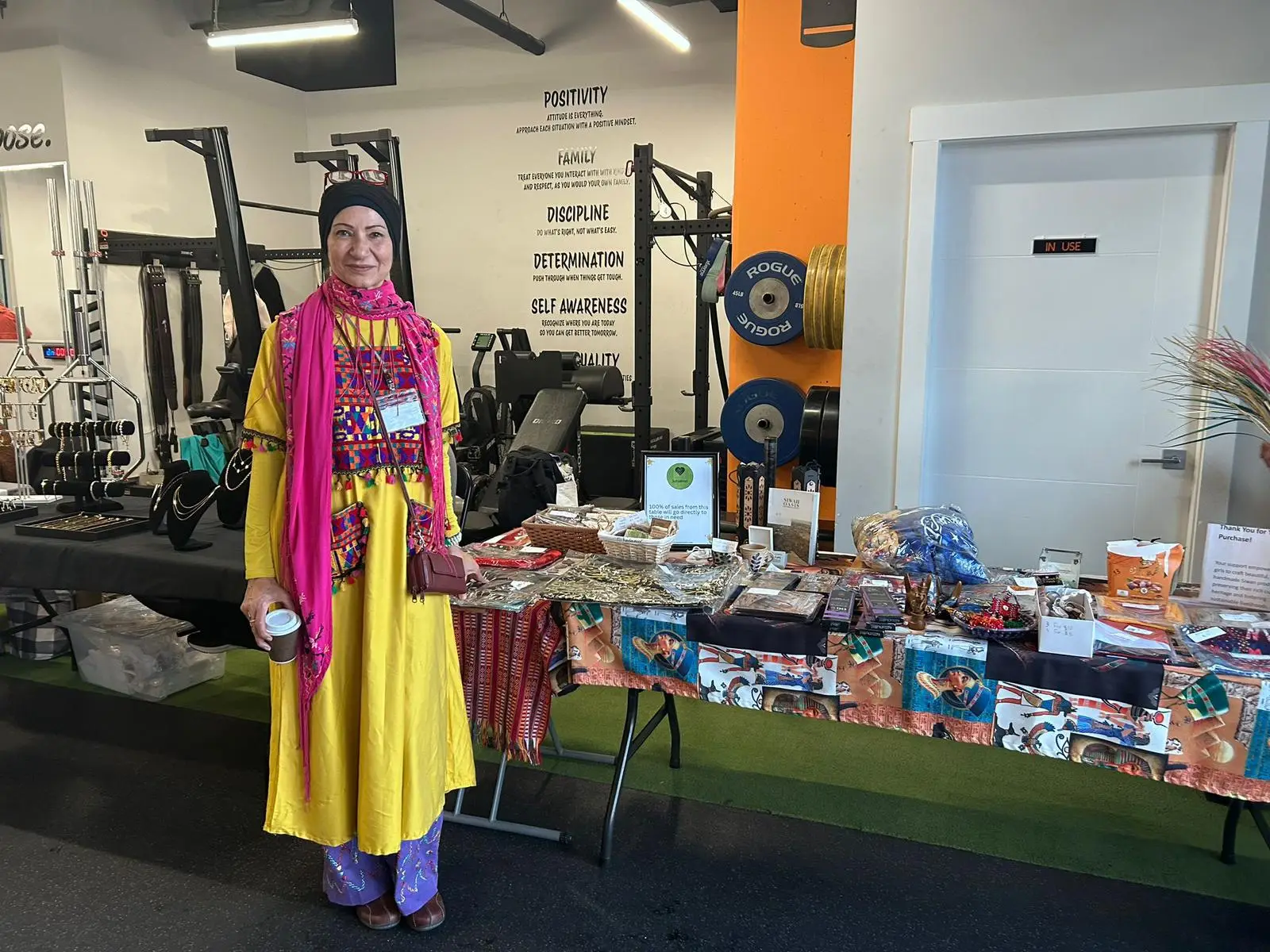 Nehal with products for sale from Siwa