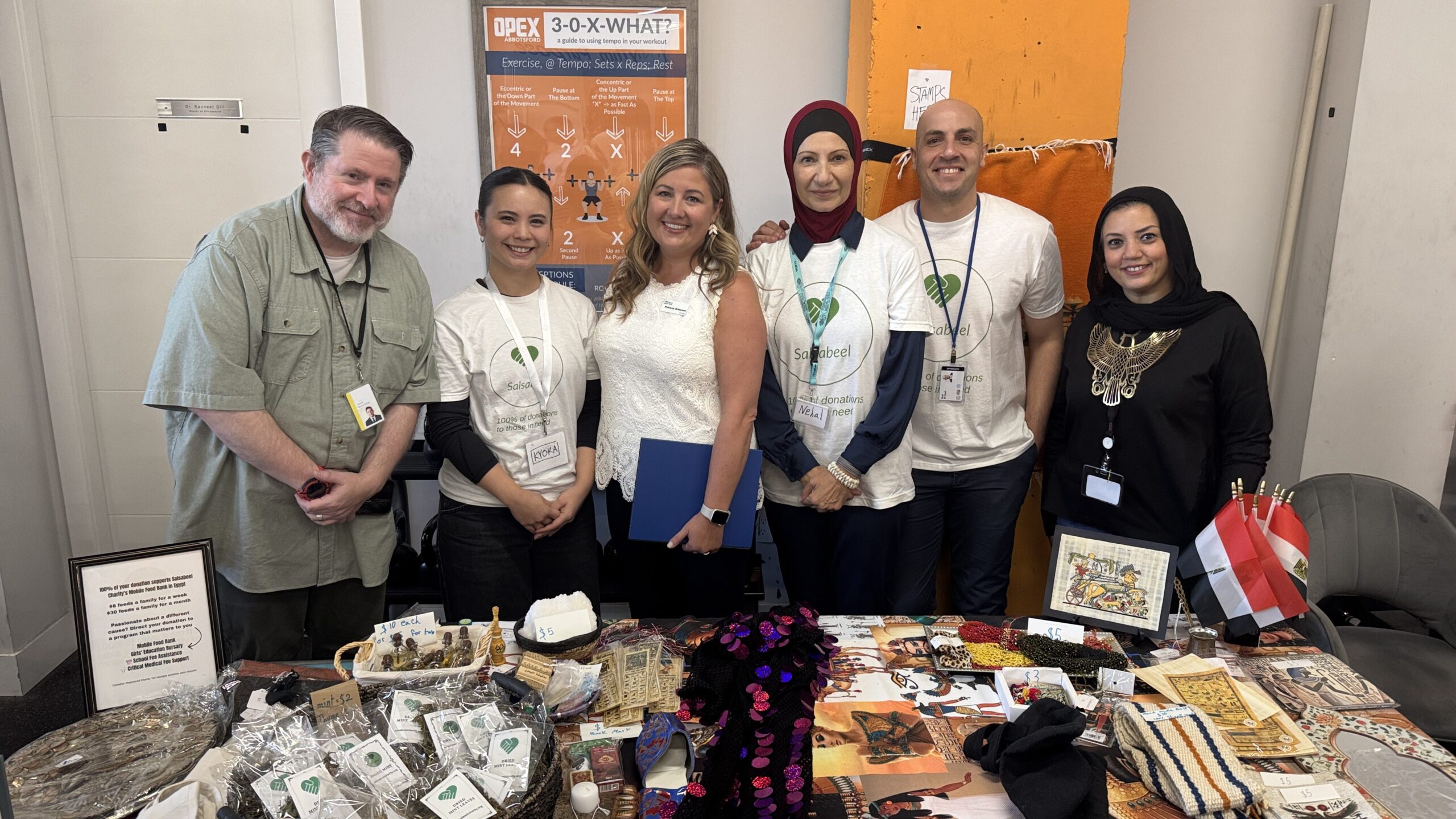 Salsabeel volunteers and community members together in Canada